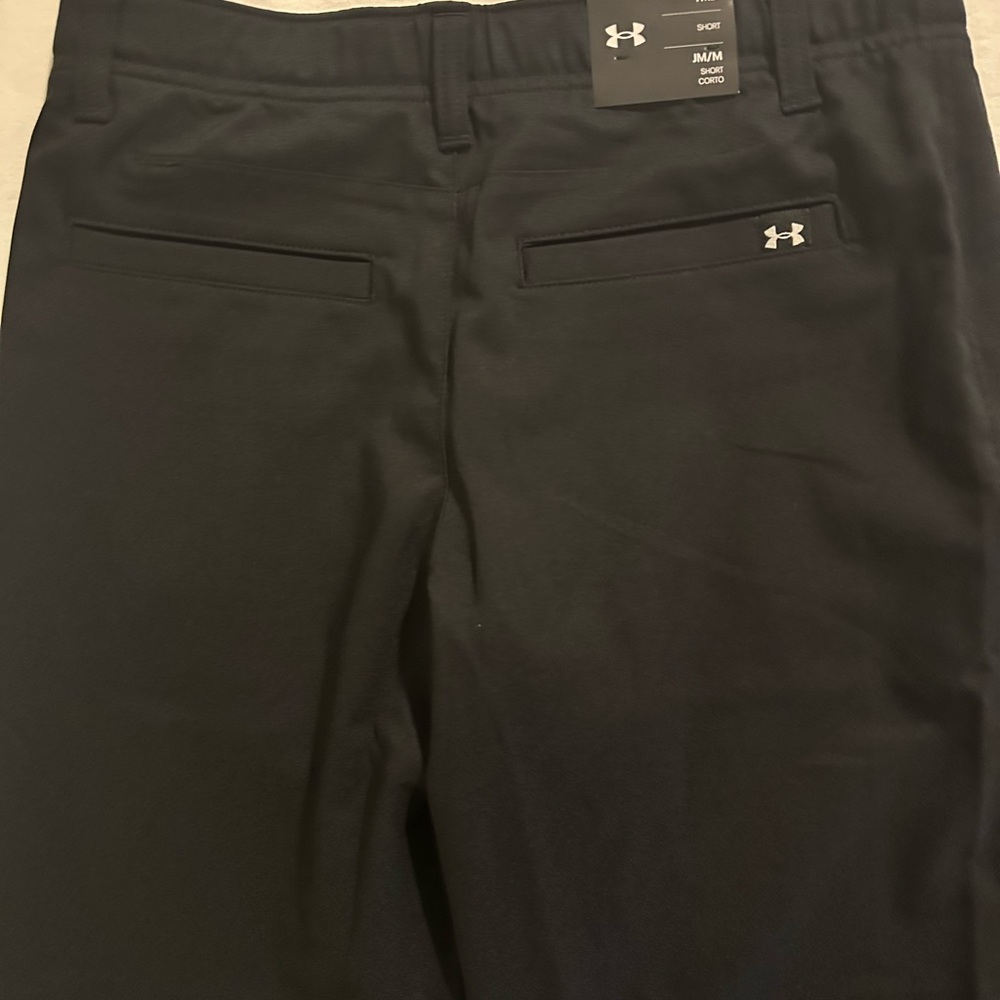 New with tags! Boys Under Armour golf shorts. Size Youth Medium (size 7/8)